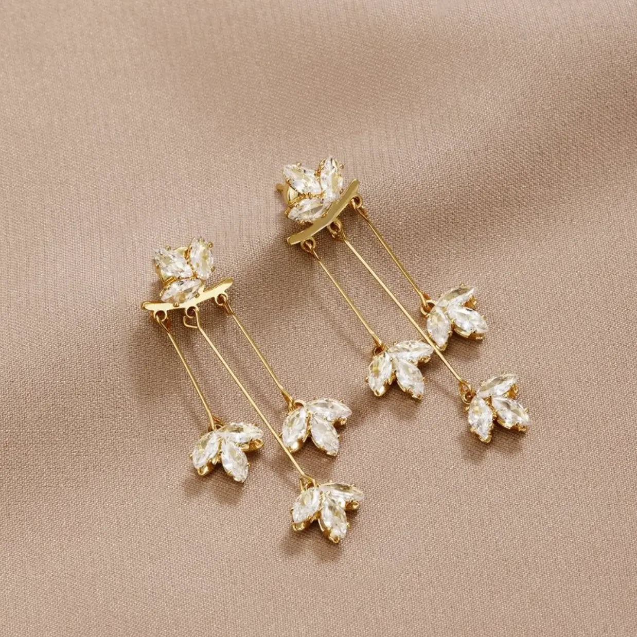 Crystal Leaf Earrings in Gold