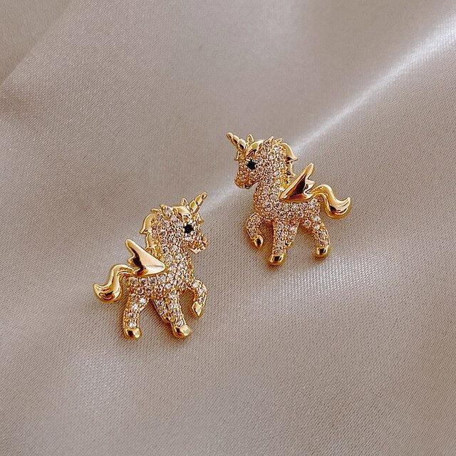 Unicorn earrings with zirconia in gold