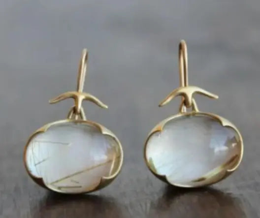 Vintage earrings with green moonstone