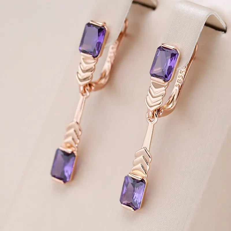 Elegant earrings with crystals in violet