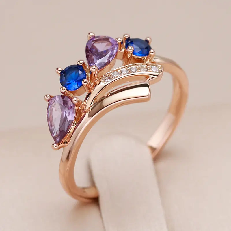 Elegant ring with gold-colored crystals