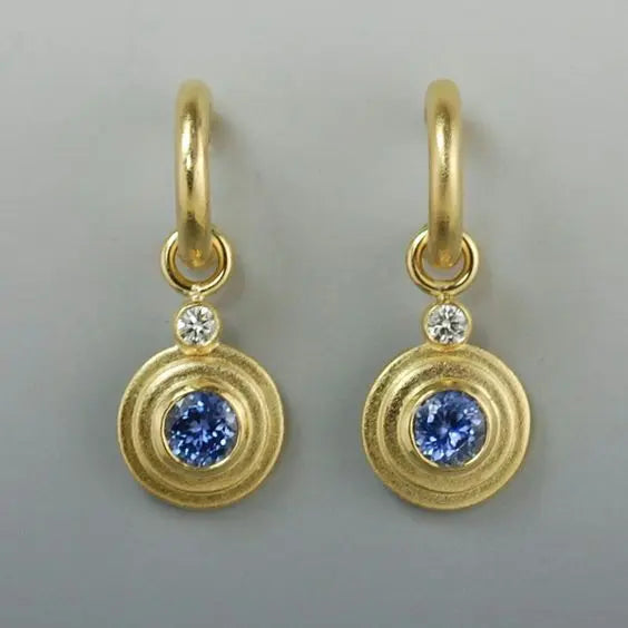Gold-plated vintage earrings with blue zirconia inlay