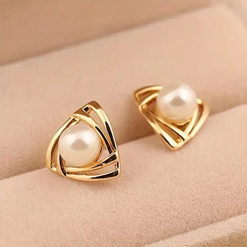Elegant gold earrings with pearls