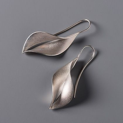 Silver earrings in leaf shape