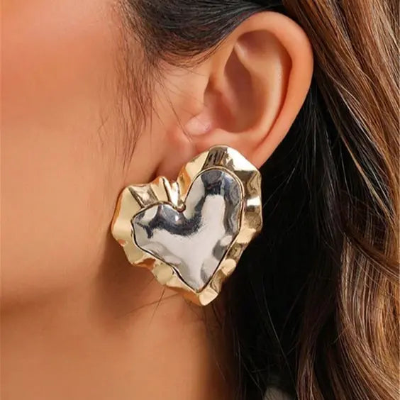 Heart earrings made of gold and silver