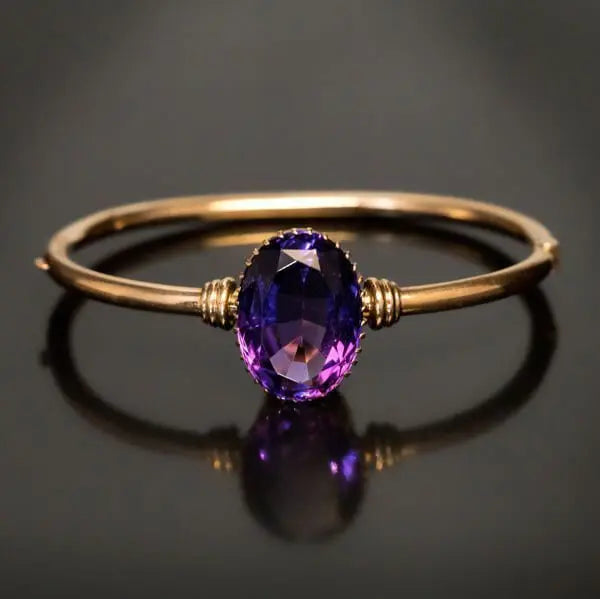 Ring with purple crystal in vintage gold