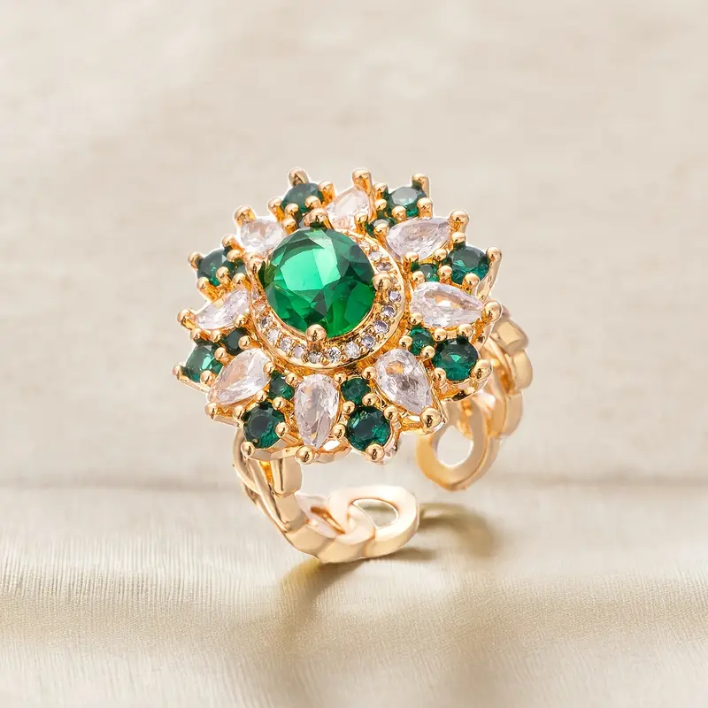 Ring with mandala pattern made of white and green crystals