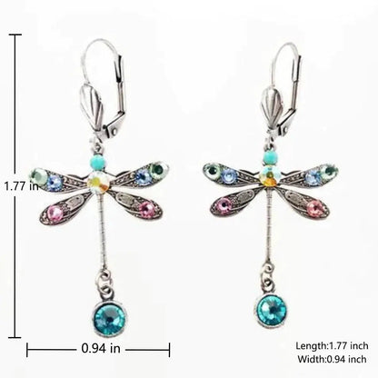 Elegant earrings in the shape of a carved dragonfly