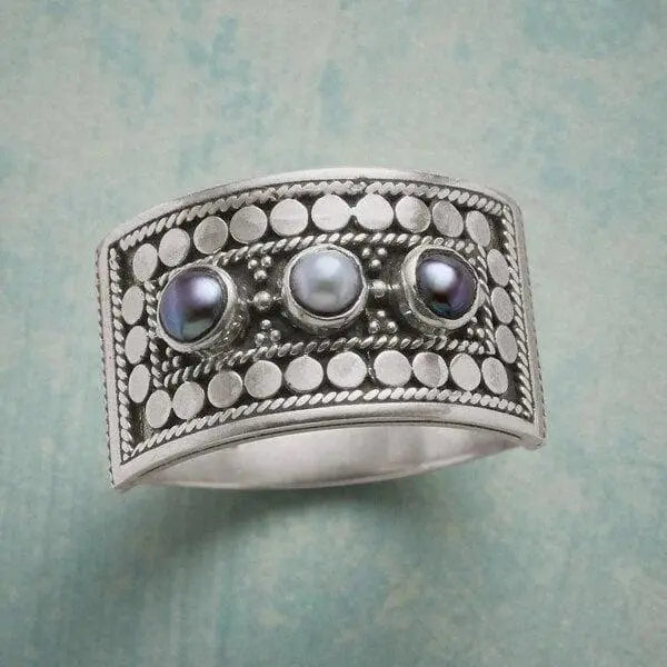 Geometric Ring with Carved Pearl and Three Stones