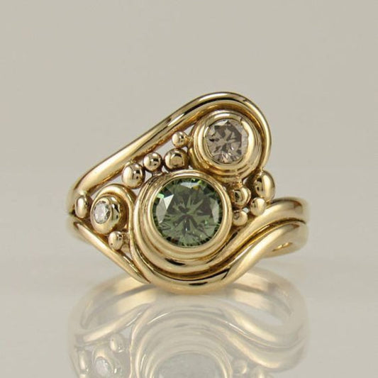 Vintage gold ring with green zirconia