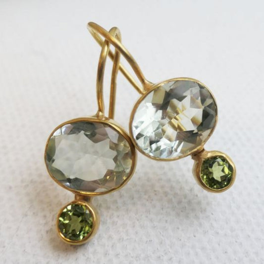 Gold earrings with green crystals