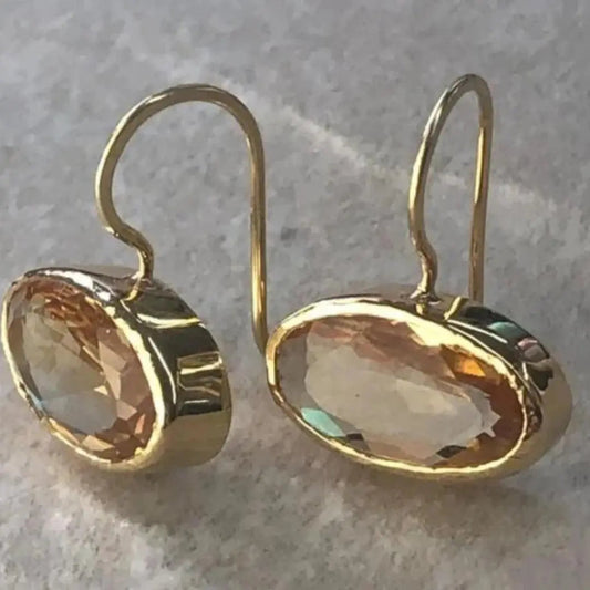 Gold earrings with crystal inlays