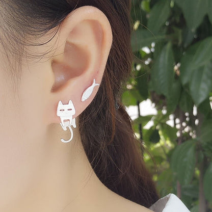 Silver earrings with fish and climbing cat