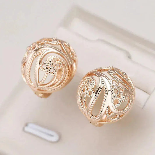 Elegant Hollow Ball Earrings in Gold