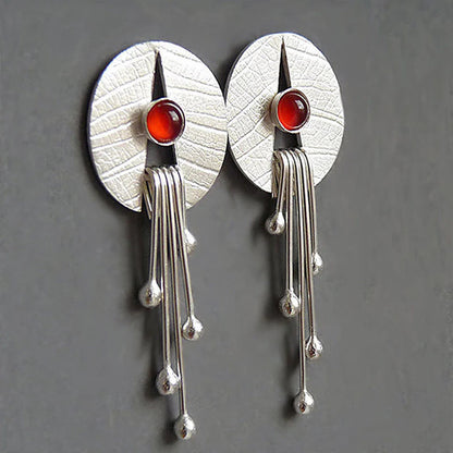 Earrings with red crystal