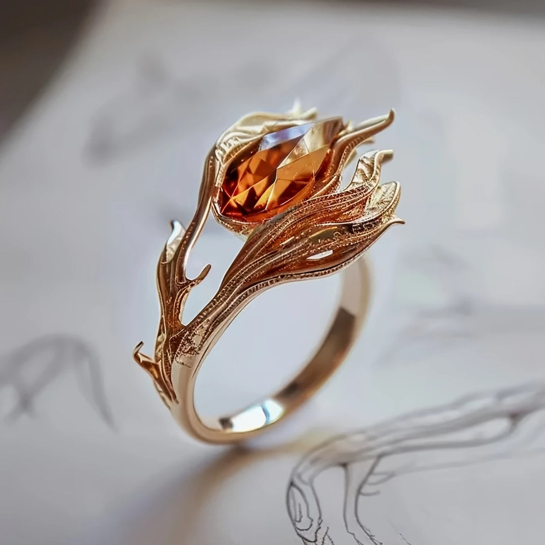 Ring with orange crystal