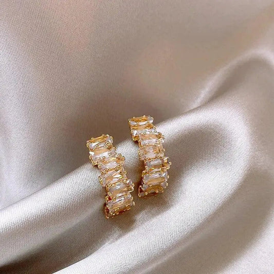 Elegant earrings with zirconia inlays