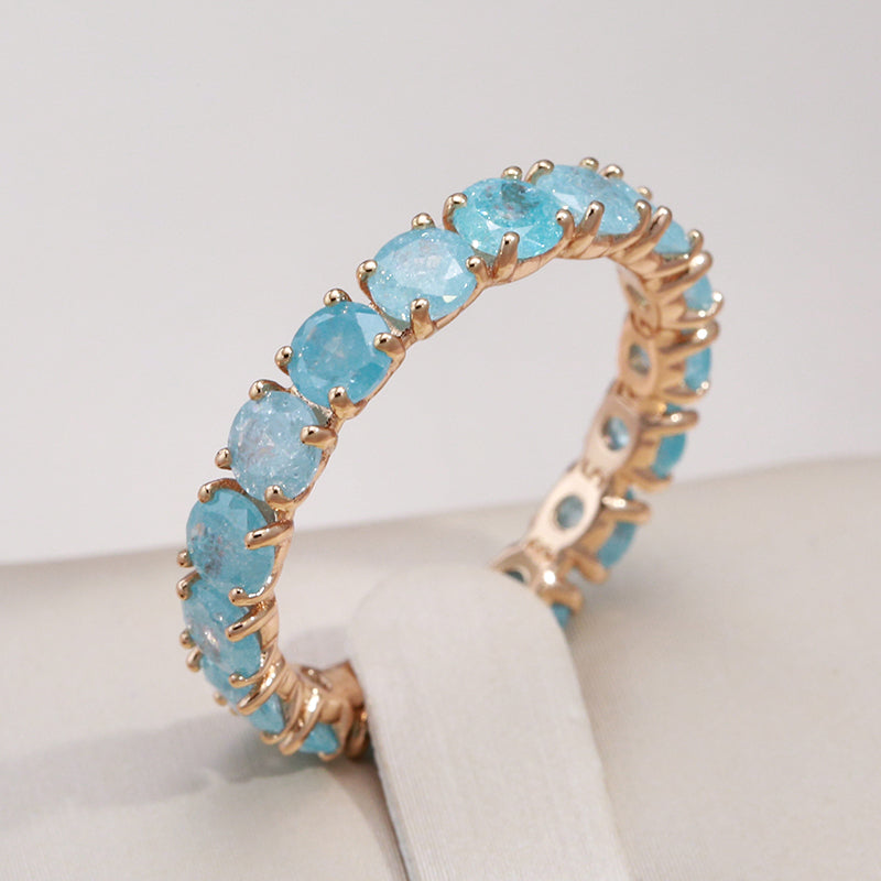 Luxurious gold ring with colored zirconia stones