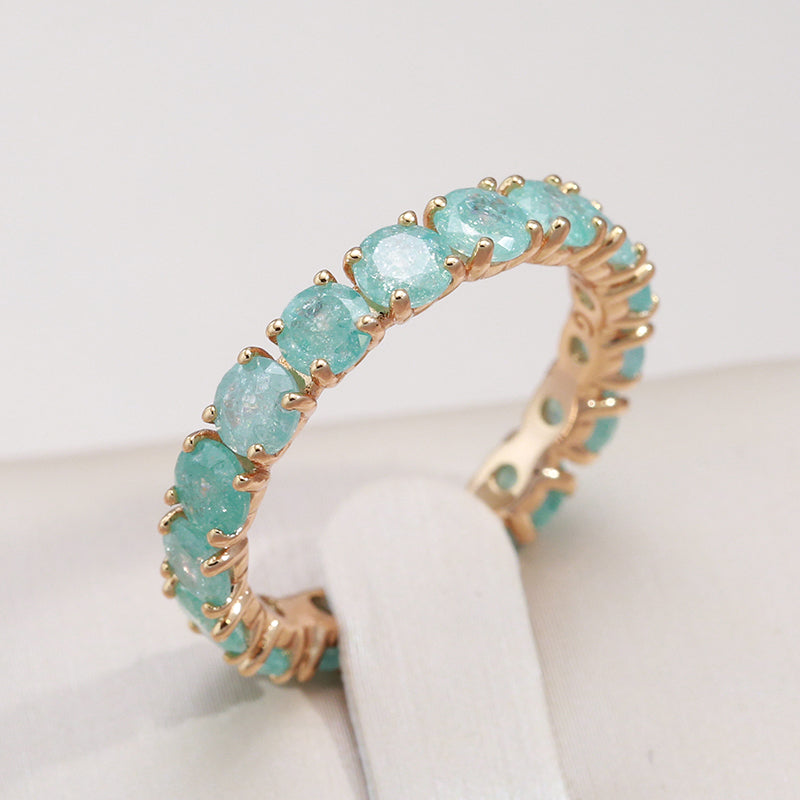 Luxurious gold ring with colored zirconia stones