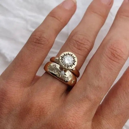 Set of forged crystal gold rings in vintage style