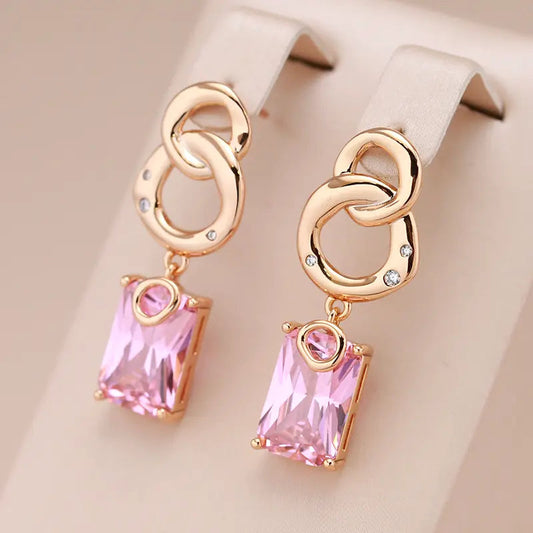 Small earrings with crystals in gold