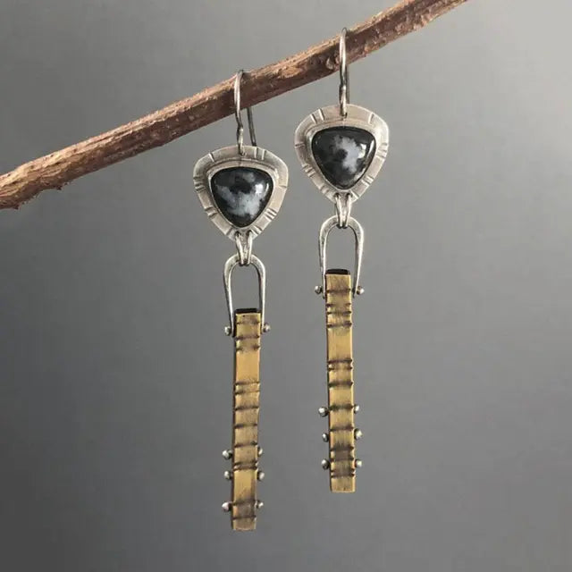 Vintage earrings with dark stone in gold and silver
