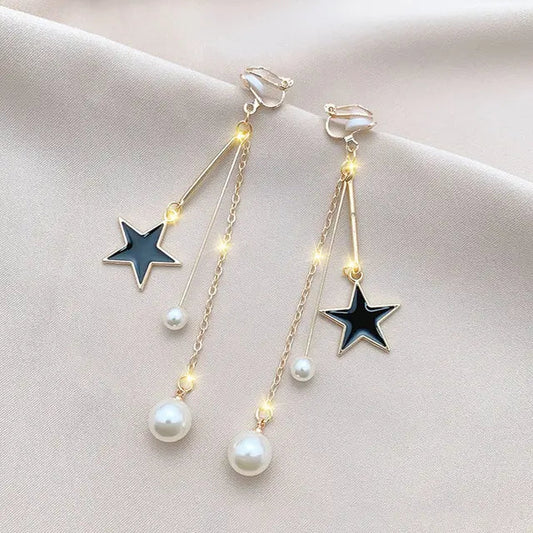 Elegant sparkling star earrings with pearls