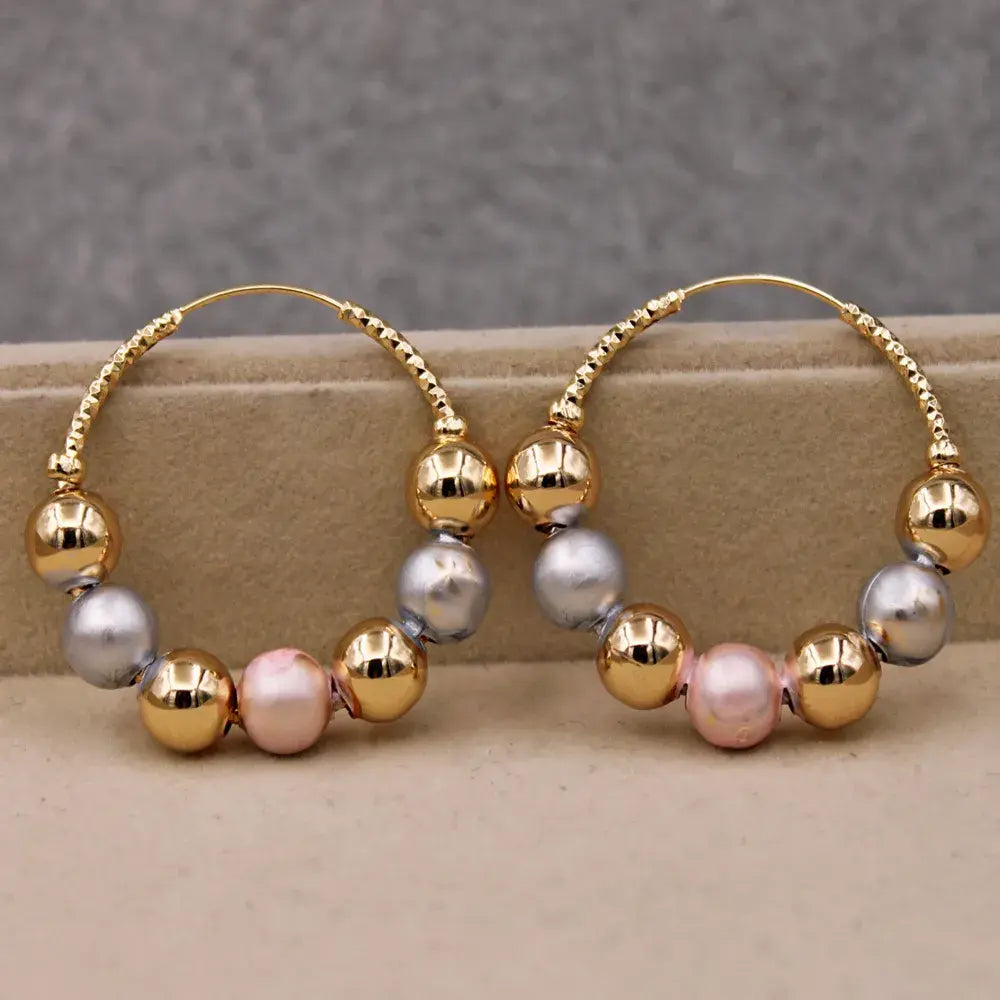 Golden earrings with vintage beads