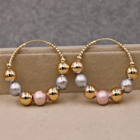 Golden earrings with vintage beads