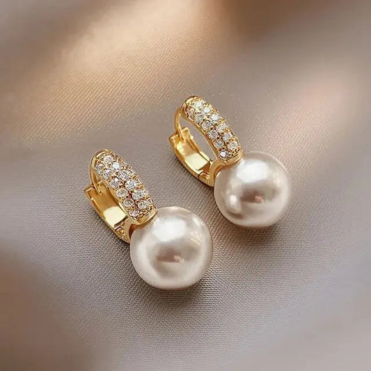 Pearl earrings with rhinestones