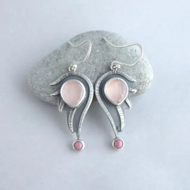 Hollow earrings with pink vintage crystals