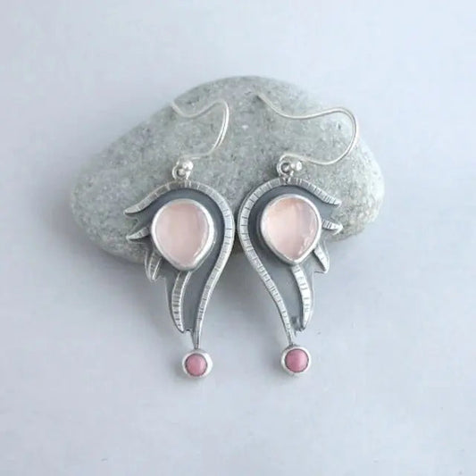 Hollow earrings with pink vintage crystals