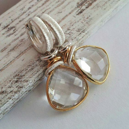 Vintage gold earrings with glitter elements and white stone