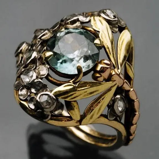 Floral Ring with Blue Crystal in Vintage Gold