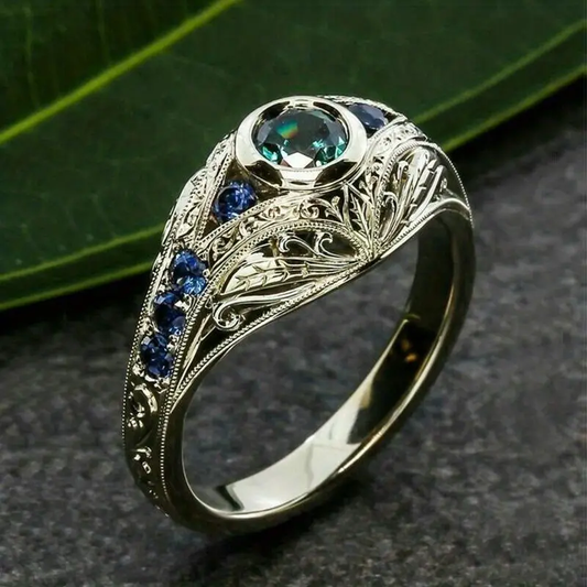 Hollow Silver Ring with Blue Crystals