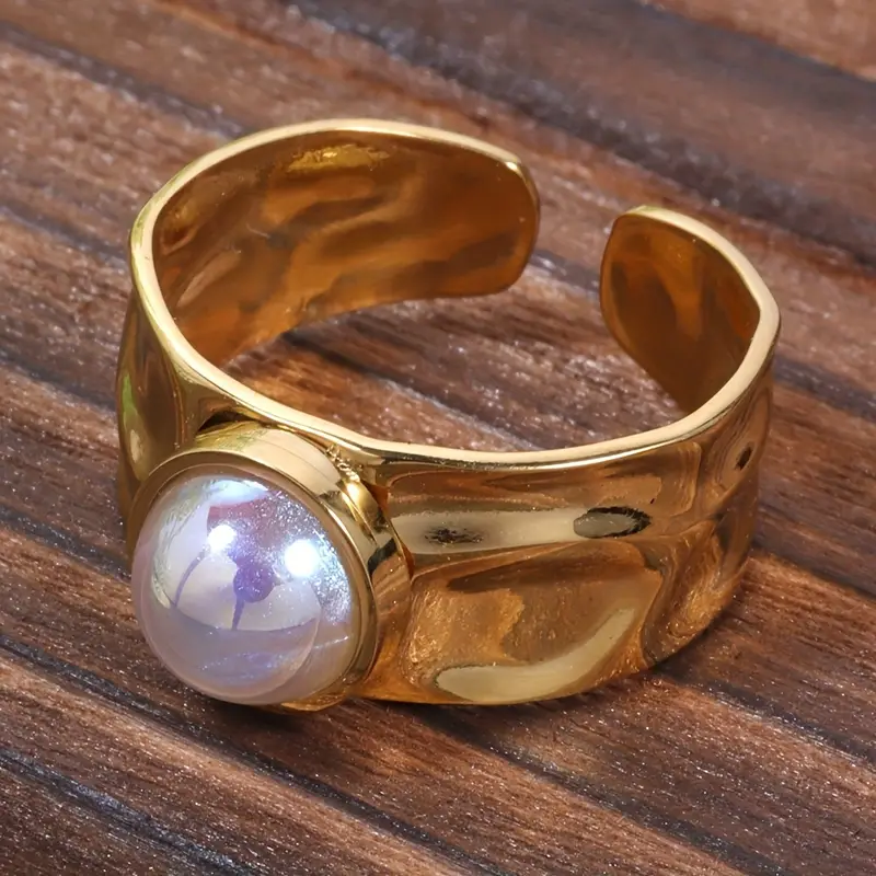 Gold ring with beautiful white pearl
