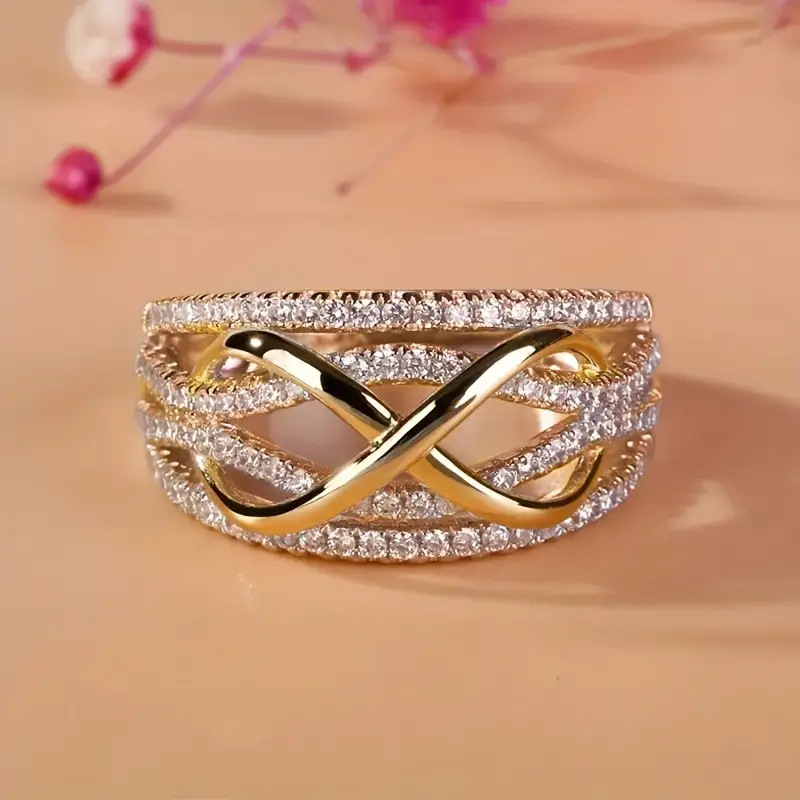 Ring with "Infinity" symbol and zirconia