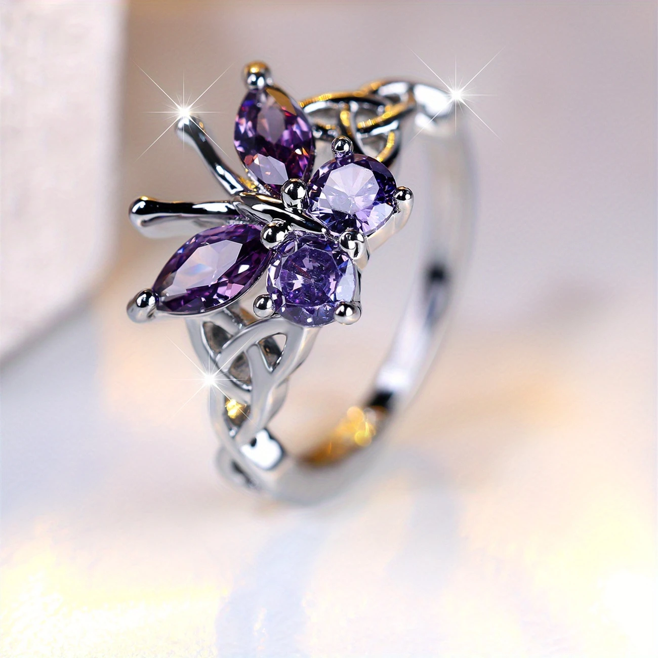 Silver ring with purple butterfly