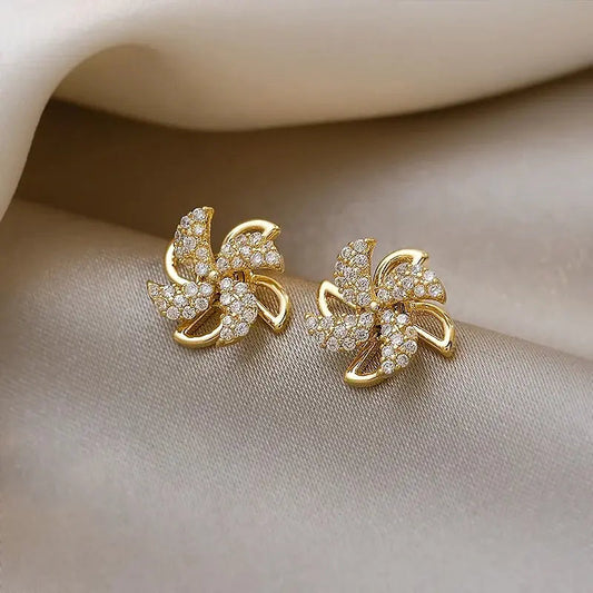Gold Pinwheel Earrings with Zirconia